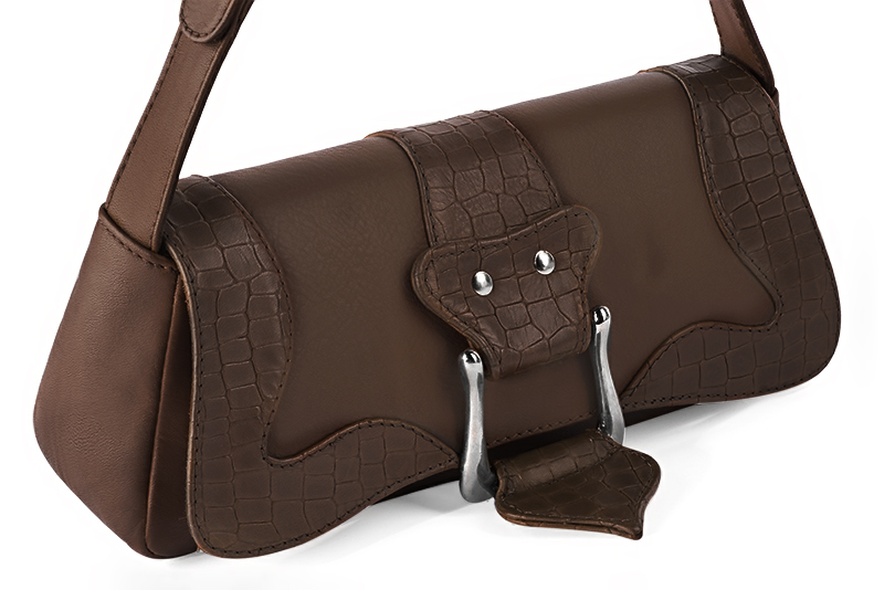 Handcrafted women's small luxurious elegant handbag in premium dark brown leather. Perfect for elevated everyday style.   
                Choose from our luxurious collections of leather and fabric to perfectly match your handbags to your outfits.